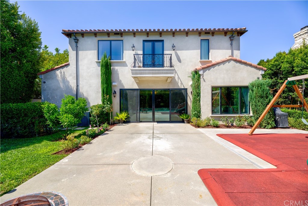 514 West Norman Avenue Arcadia, CA 91007 - Photo 57 of 69 a front view of a house with a yard and potted plants