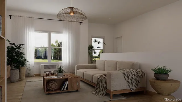 a spacious bedroom with a bed and a couch