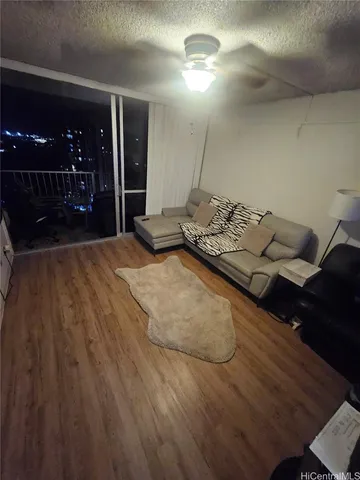 a bedroom with a bed and lamp with window