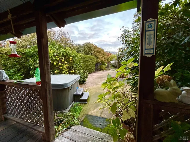 a view of a porch with garden