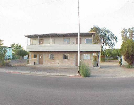 1640 Mill Street Reno, NV 89502 - Photo 1 of 1 a front view of a house with garage