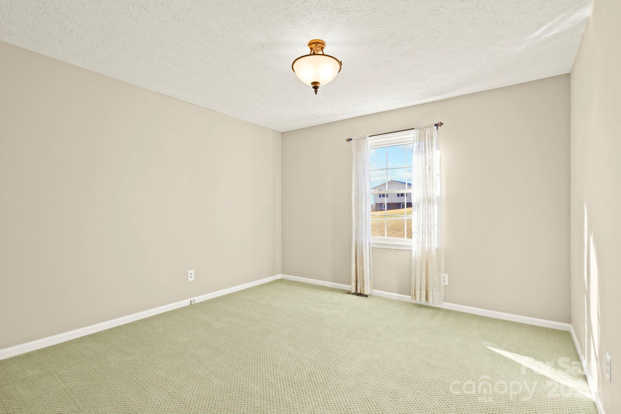 2216 Olde Well Road Hudson, NC 28638 - Photo 17 of 48 a view of an empty room