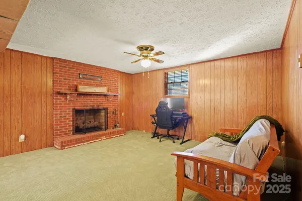 a living room with furniture a dining table and chairs