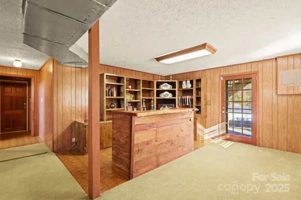 a view of workspace with furniture and storage