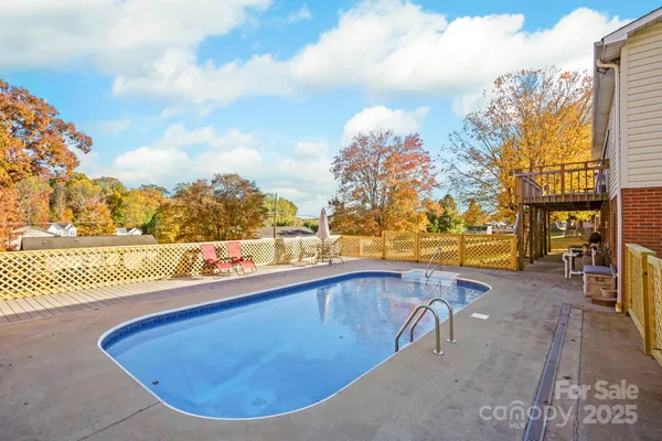 a view of outdoor space and swimming pool