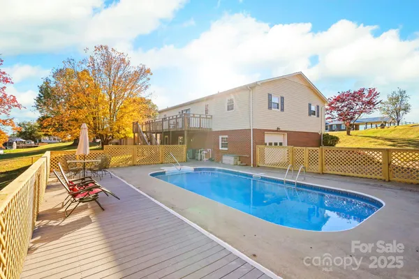 a view of a balcony with chairs