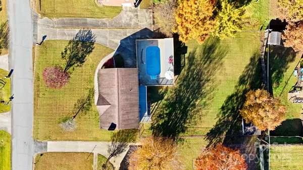 swimming pool view with a outdoor seating