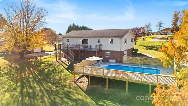 a picture of a bathroom with a shower