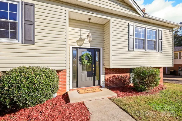 a view of a entryway door front of a house