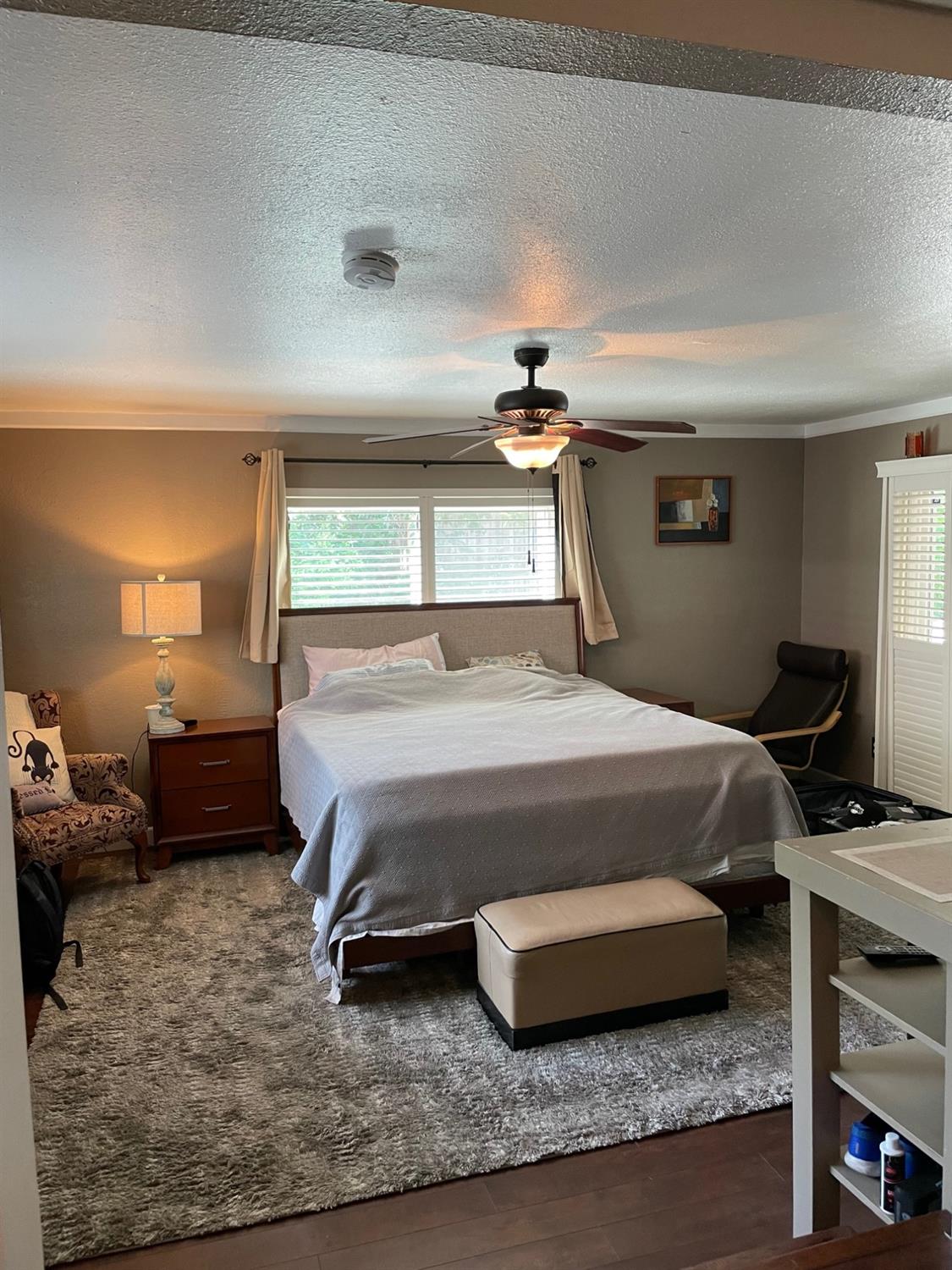 1606 Bay Meadows Drive Modesto, CA 95350 - Photo 18 of 20 a bedroom with a bed and a night stand