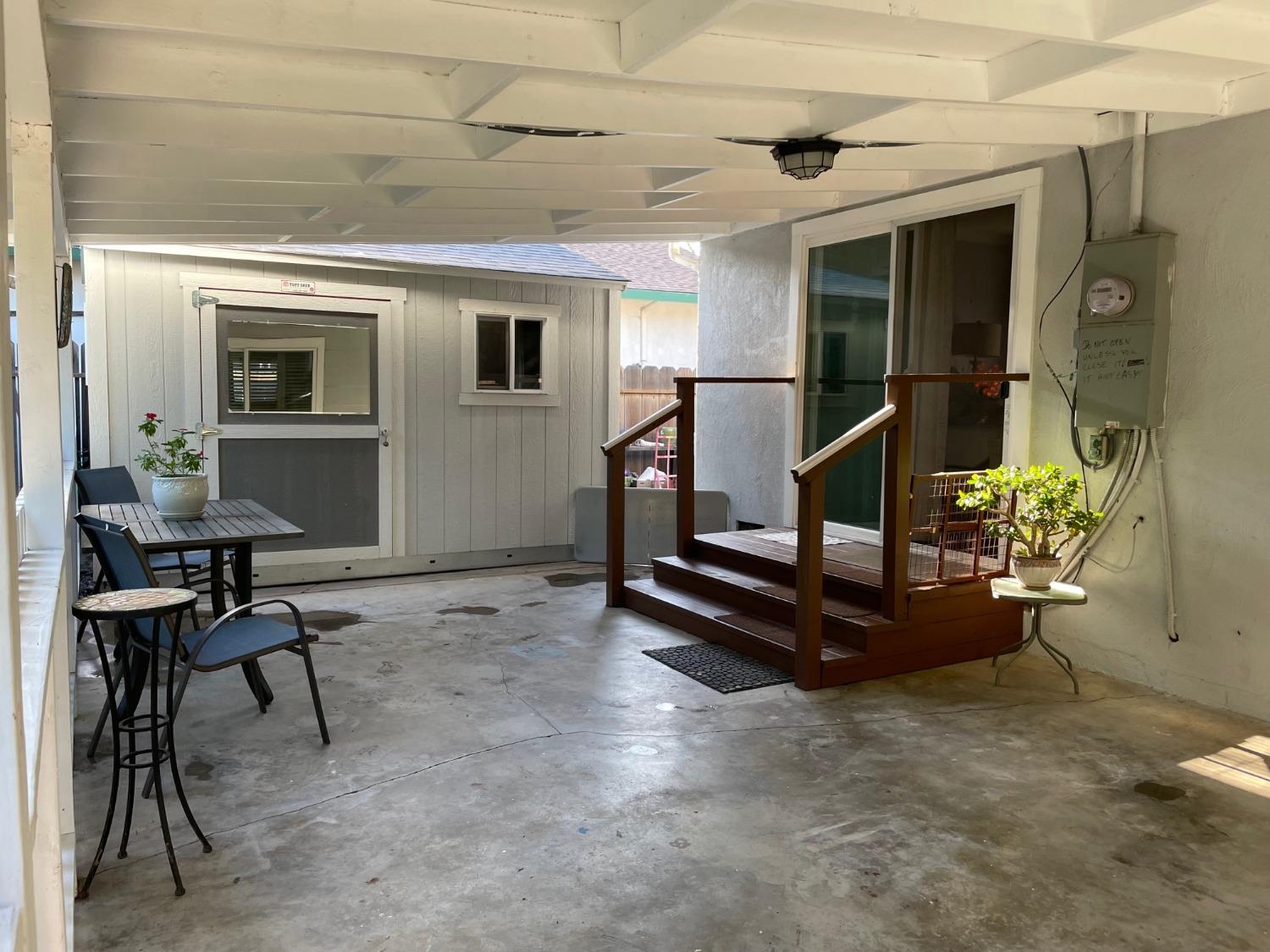 1606 Bay Meadows Drive Modesto, CA 95350 - Photo 20 of 20 a room with table and chairs