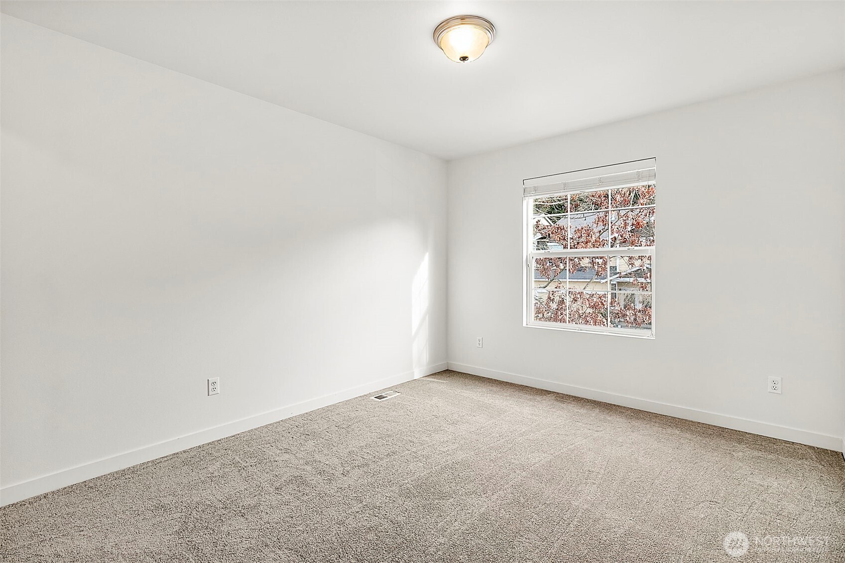 27729 257th Avenue Southeast Maple Valley, WA 98038 - Photo 21 of 40 an empty room with a window