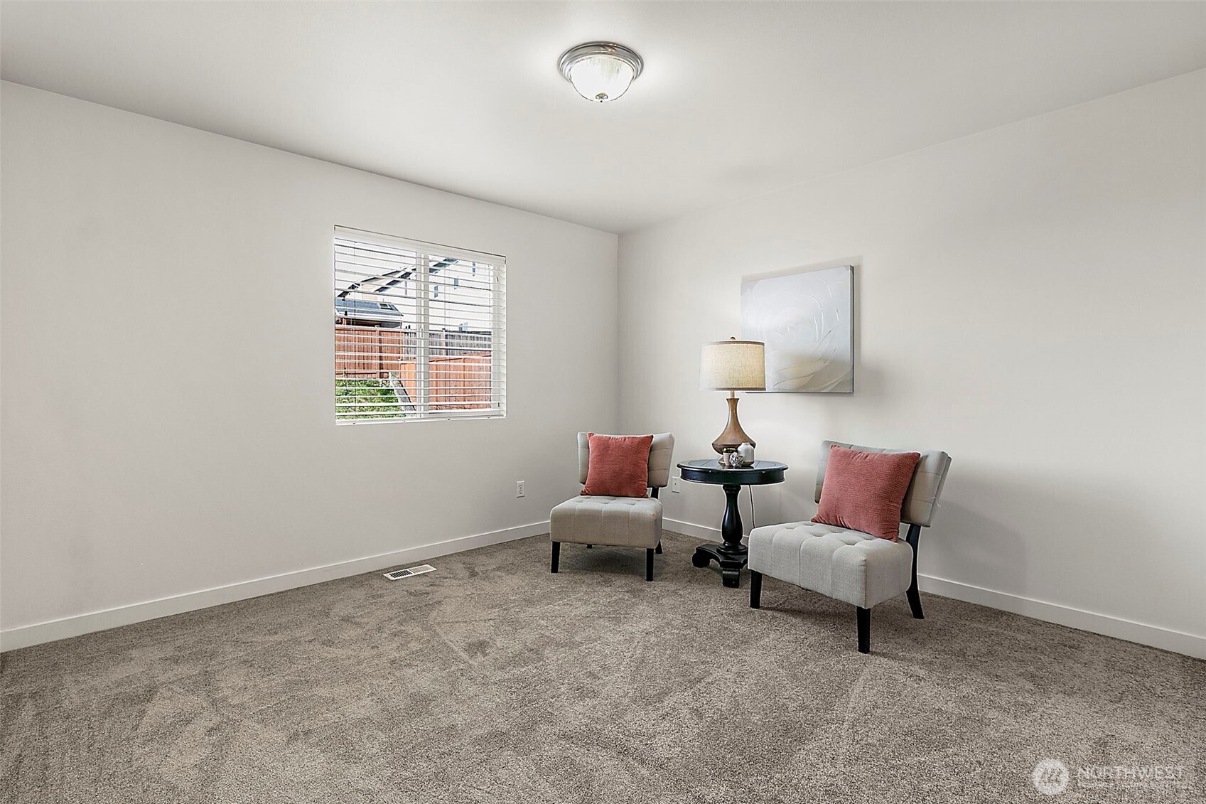 27729 257th Avenue Southeast Maple Valley, WA 98038 - Photo 23 of 40 a living room with furniture and a window