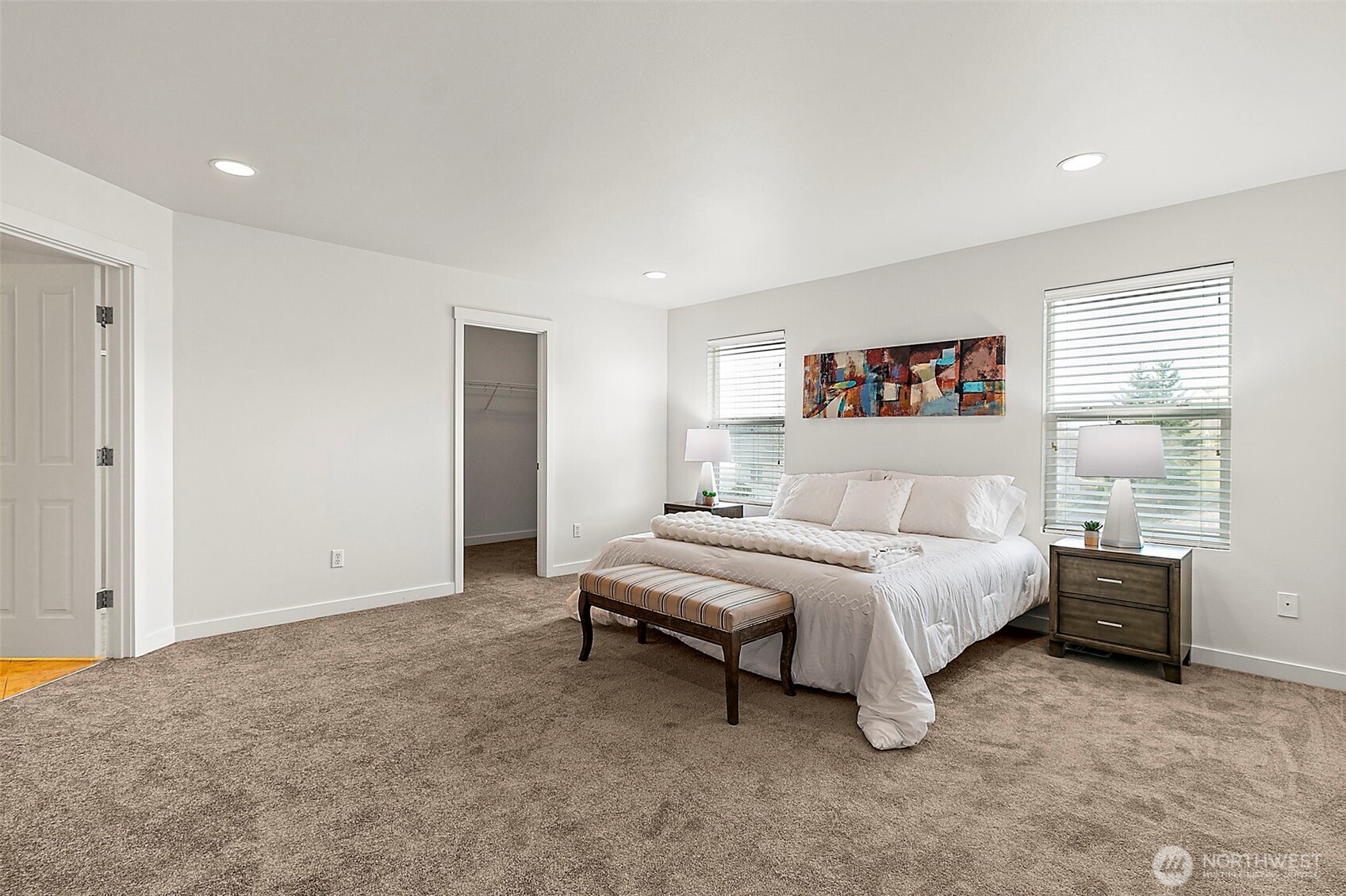 27729 257th Avenue Southeast Maple Valley, WA 98038 - Photo 25 of 40 a spacious bedroom with a bed and a cabinets