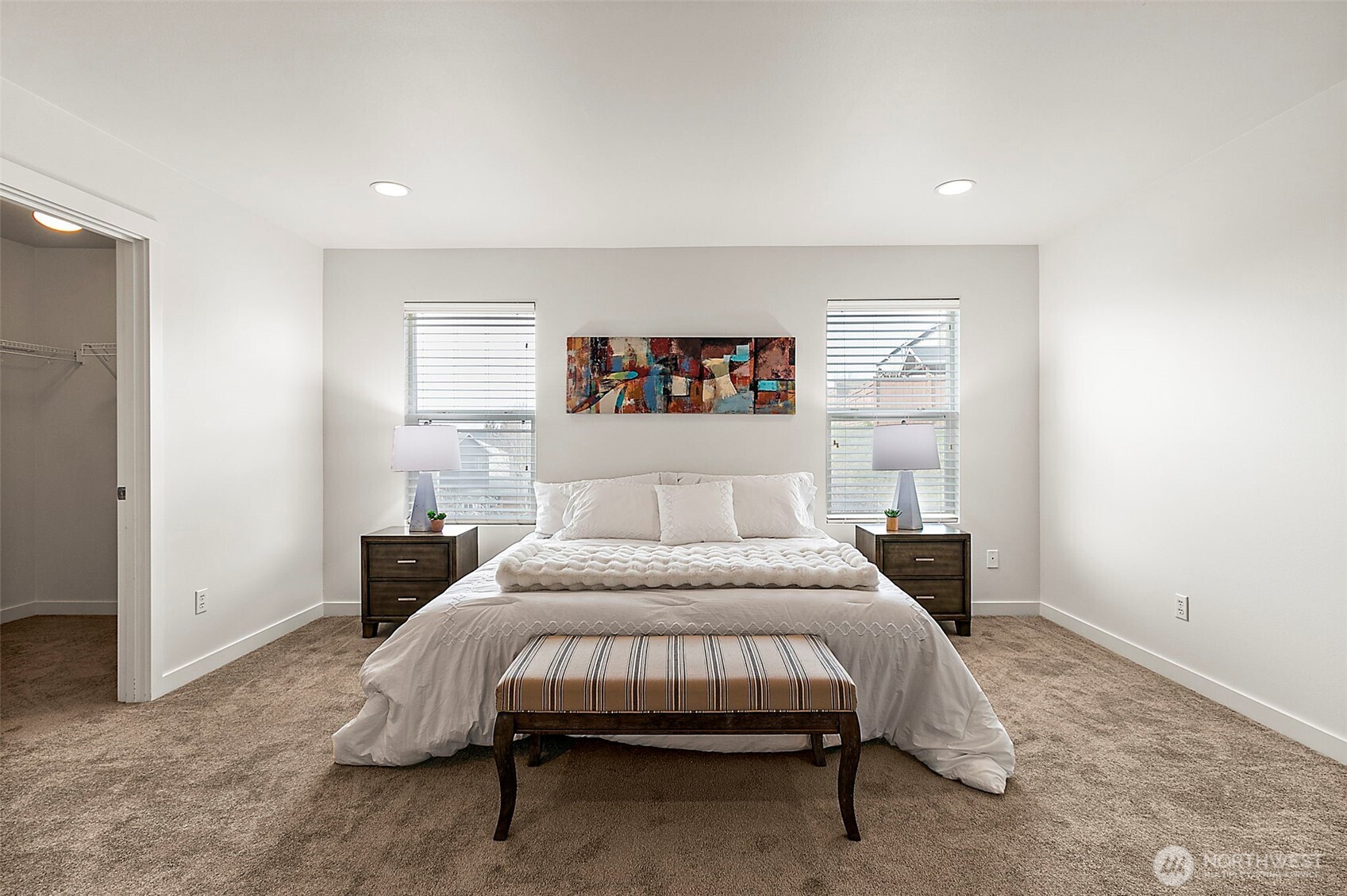 27729 257th Avenue Southeast Maple Valley, WA 98038 - Photo 26 of 40 a bedroom with a bed and a wall painting
