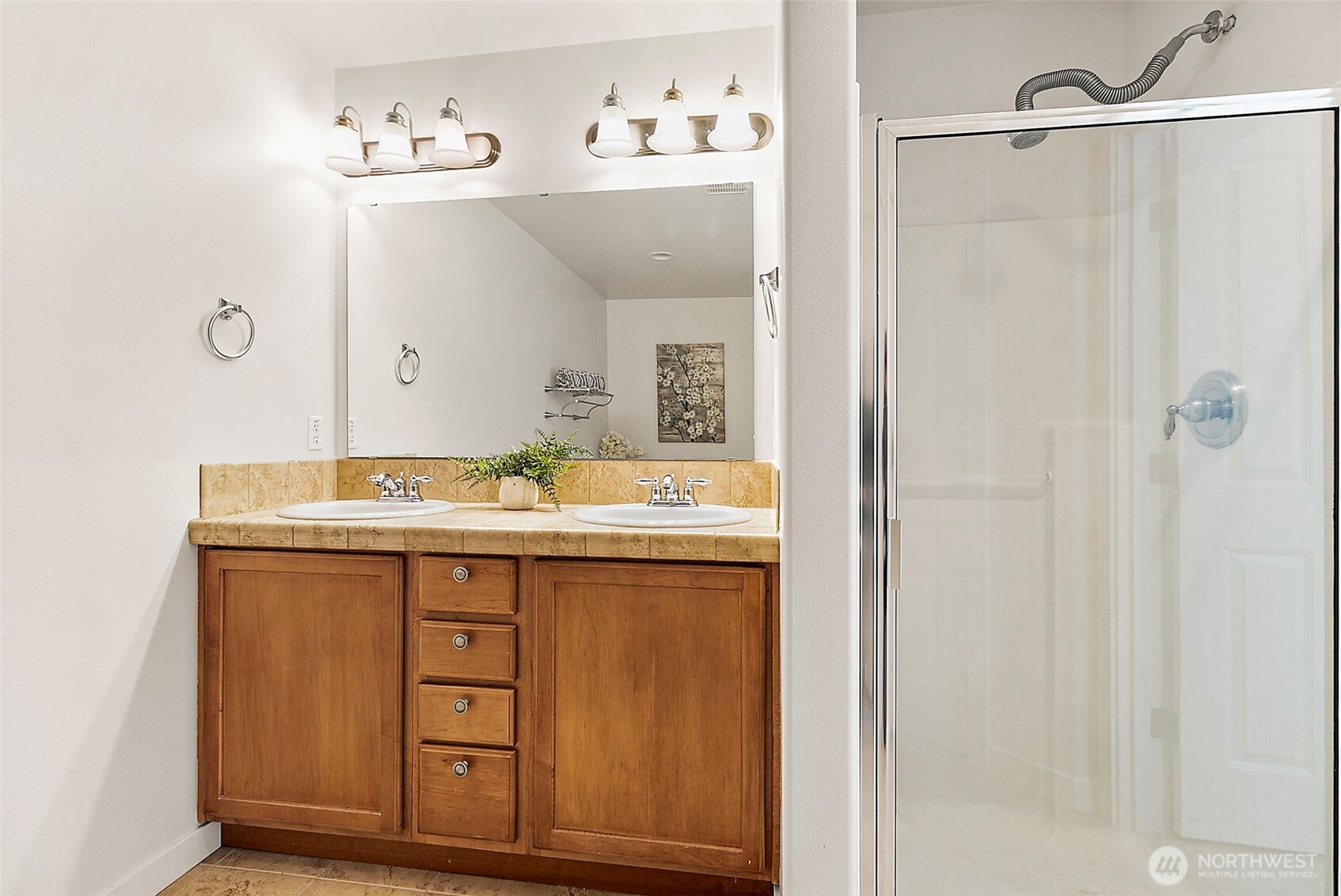 27729 257th Avenue Southeast Maple Valley, WA 98038 - Photo 28 of 40 a bathroom with a sink vanity and mirror