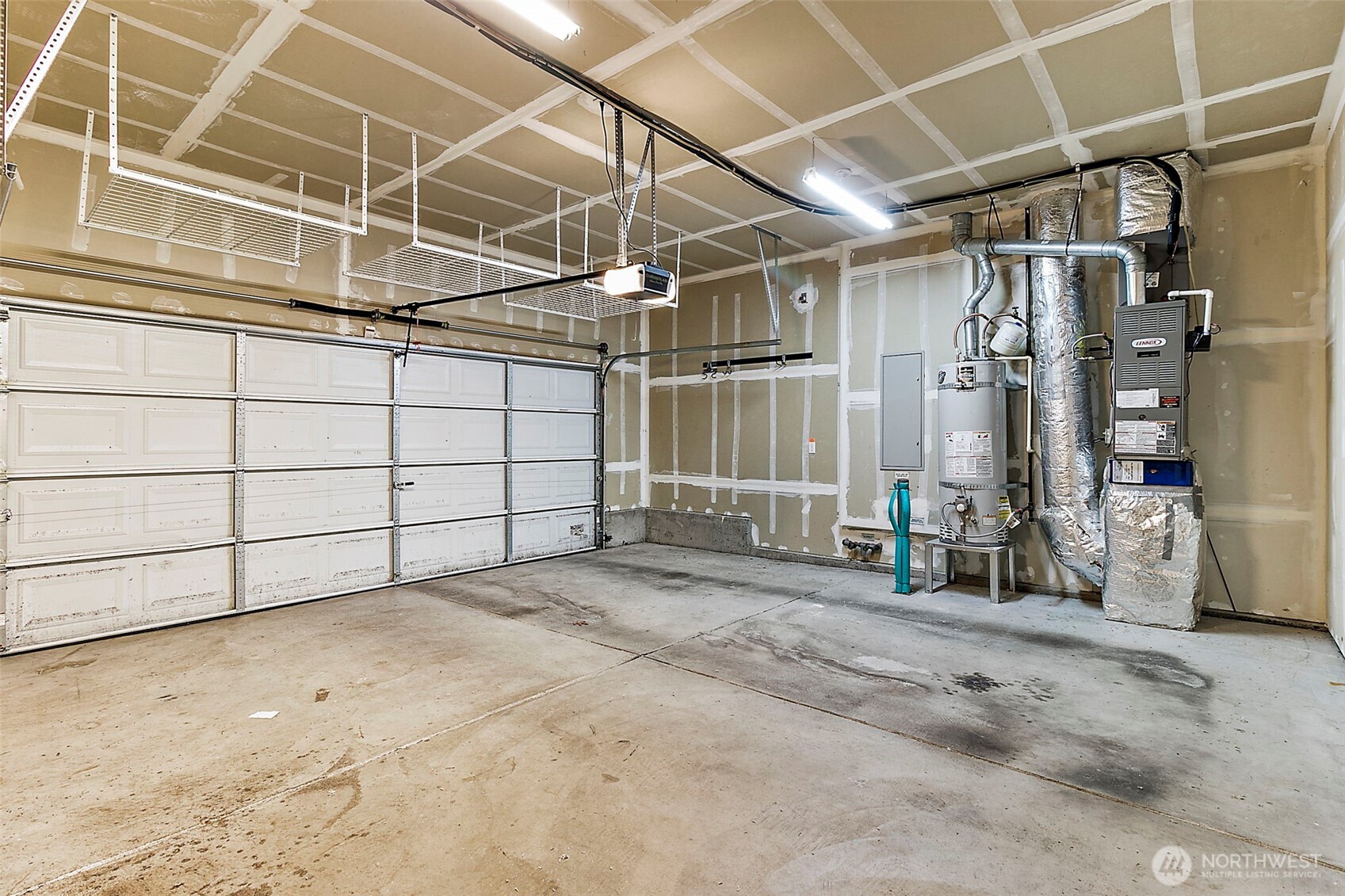 27729 257th Avenue Southeast Maple Valley, WA 98038 - Photo 31 of 40 a view of a garage with wooden floor