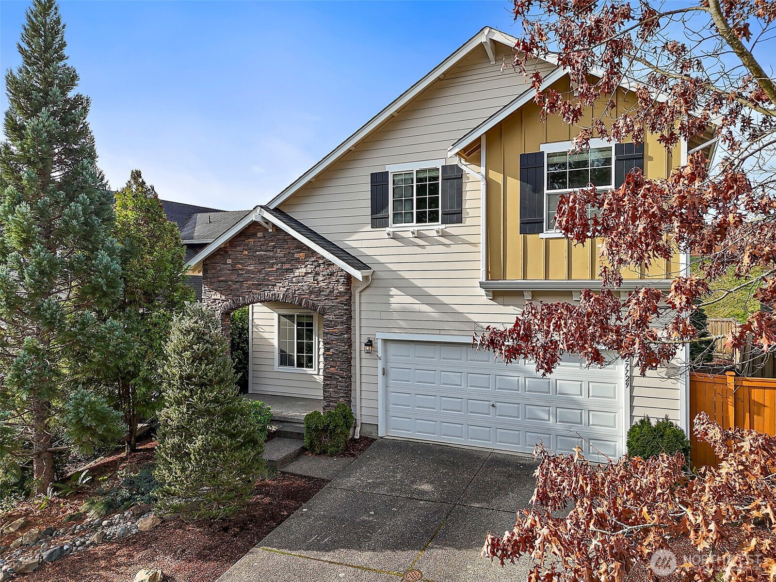 27729 257th Avenue Southeast Maple Valley, WA 98038 - Photo 32 of 40 a view of a house with a yard