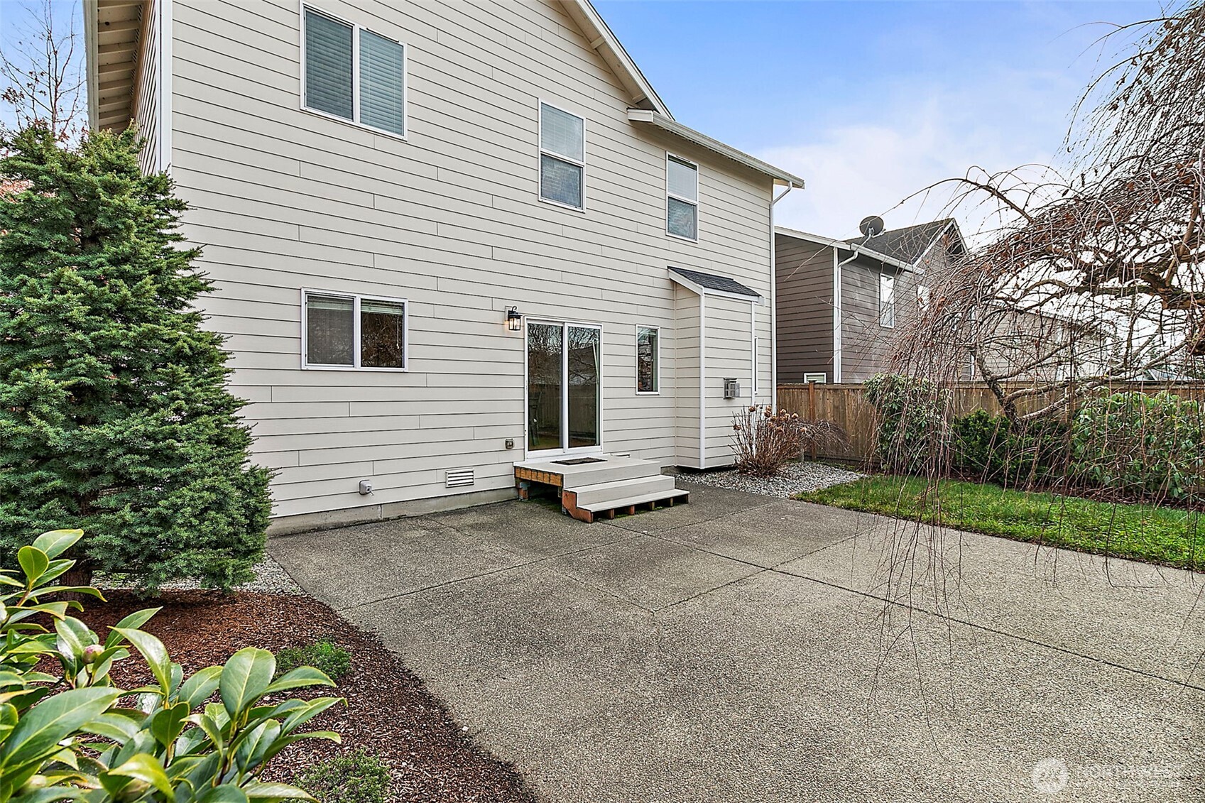 27729 257th Avenue Southeast Maple Valley, WA 98038 - Photo 35 of 40 a view of a house with a backyard