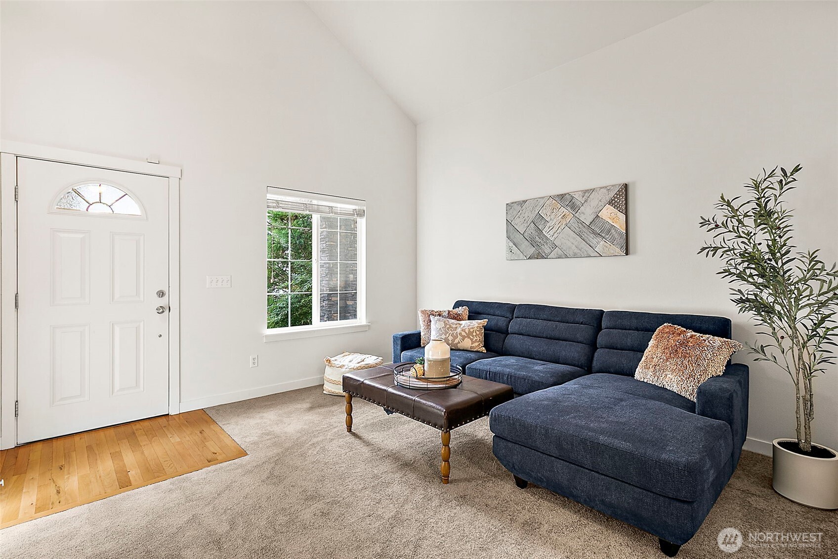 27729 257th Avenue Southeast Maple Valley, WA 98038 - Photo 5 of 40 a living room with furniture and a window