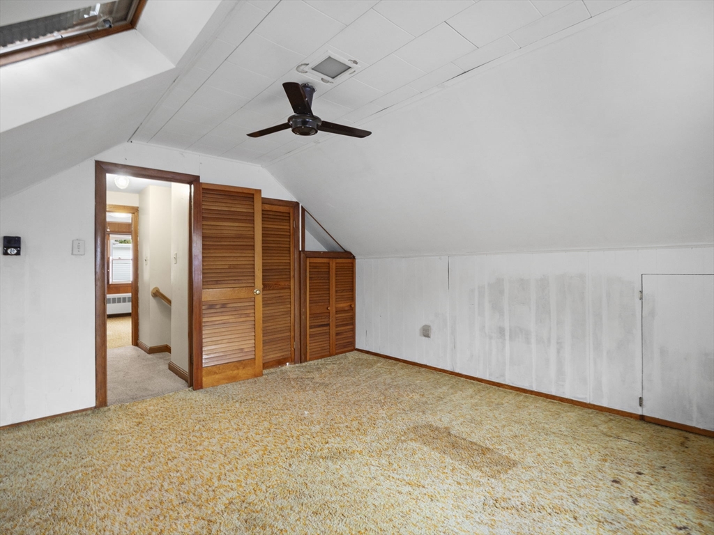 11 Dane Street Peabody, MA 01960 - Photo 22 of 27 a view of an empty room with a ceiling fan