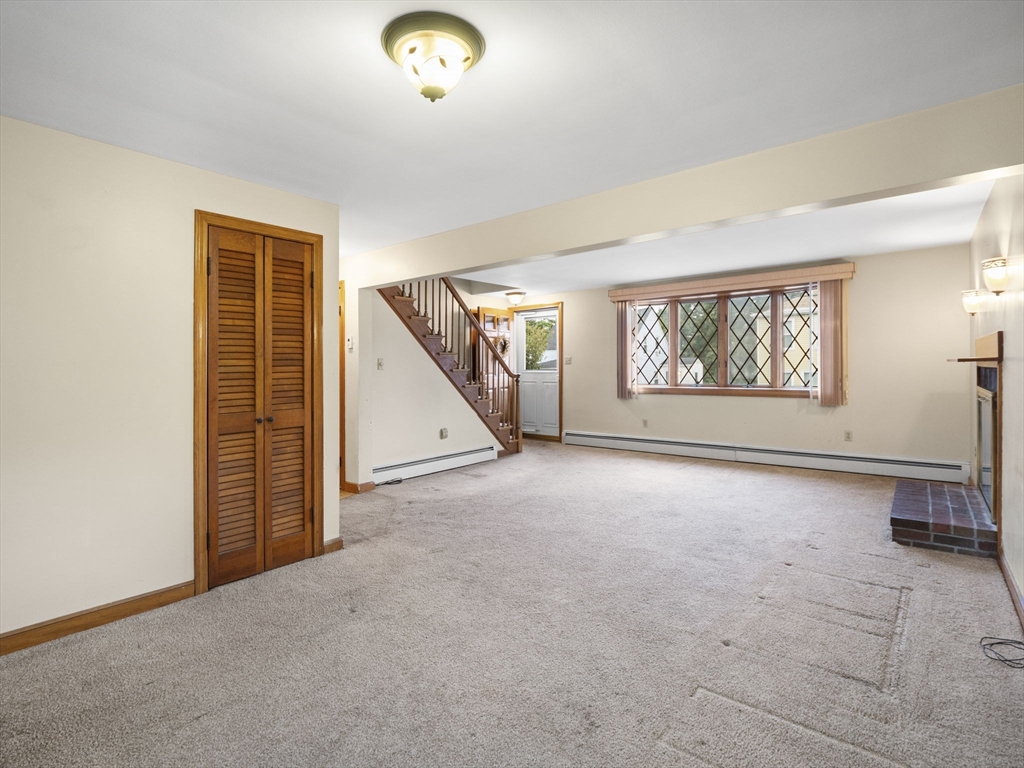 11 Dane Street Peabody, MA 01960 - Photo 4 of 27 an empty room with windows