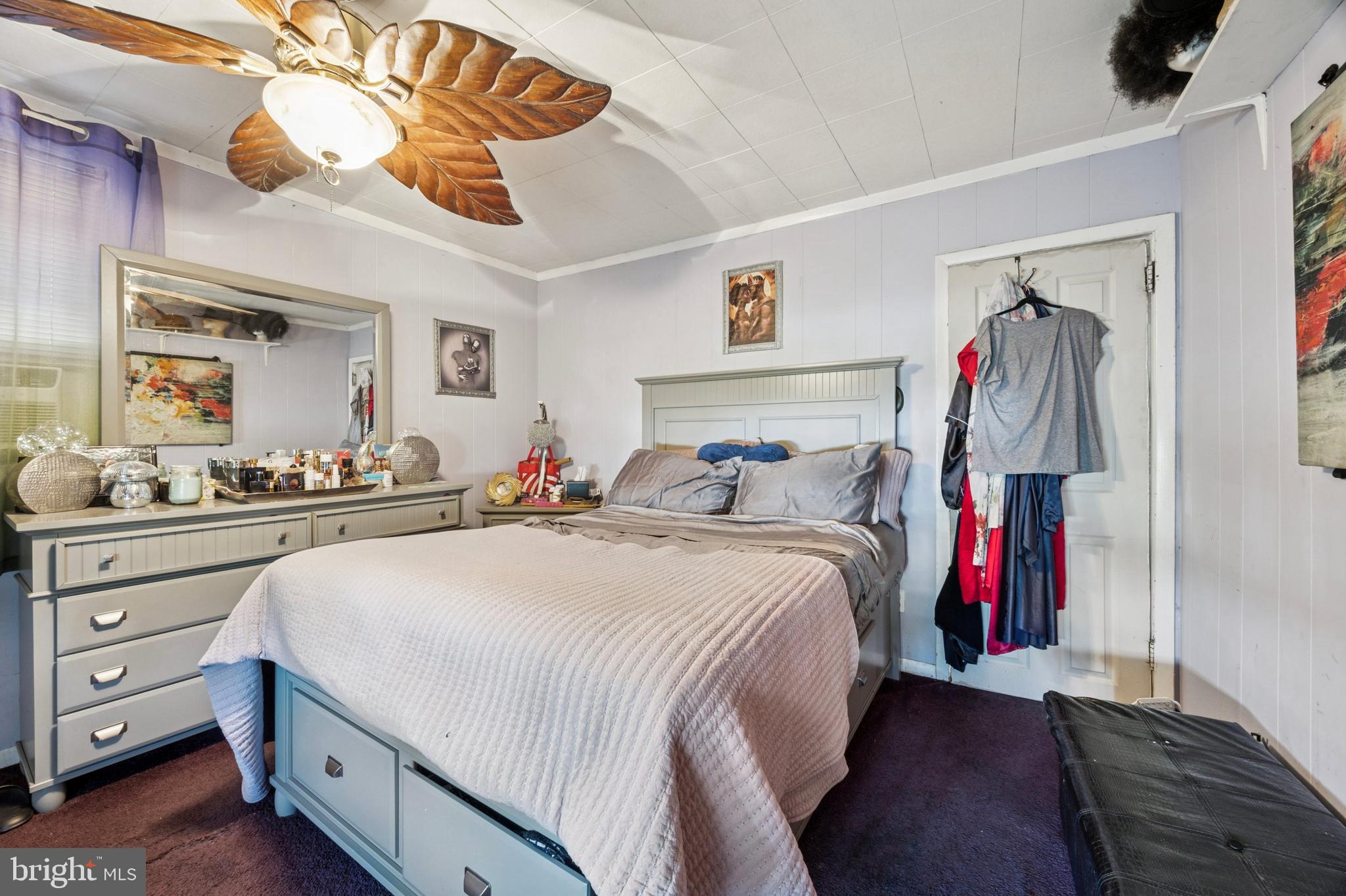 722 Yeadon Avenue Lansdowne, PA 19050 - Photo 13 of 23 a bed room with a bed and a mirror