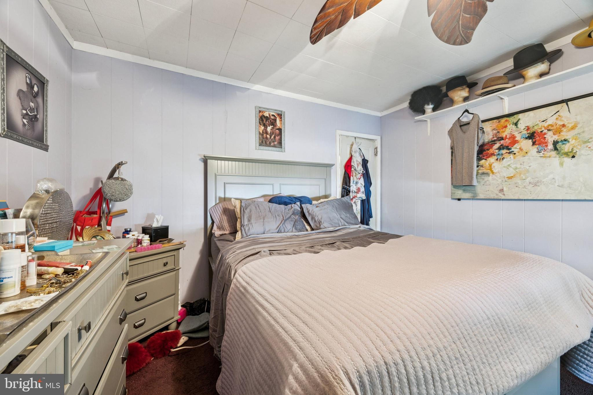 722 Yeadon Avenue Lansdowne, PA 19050 - Photo 14 of 23 a bedroom that has a bed and a baby bed