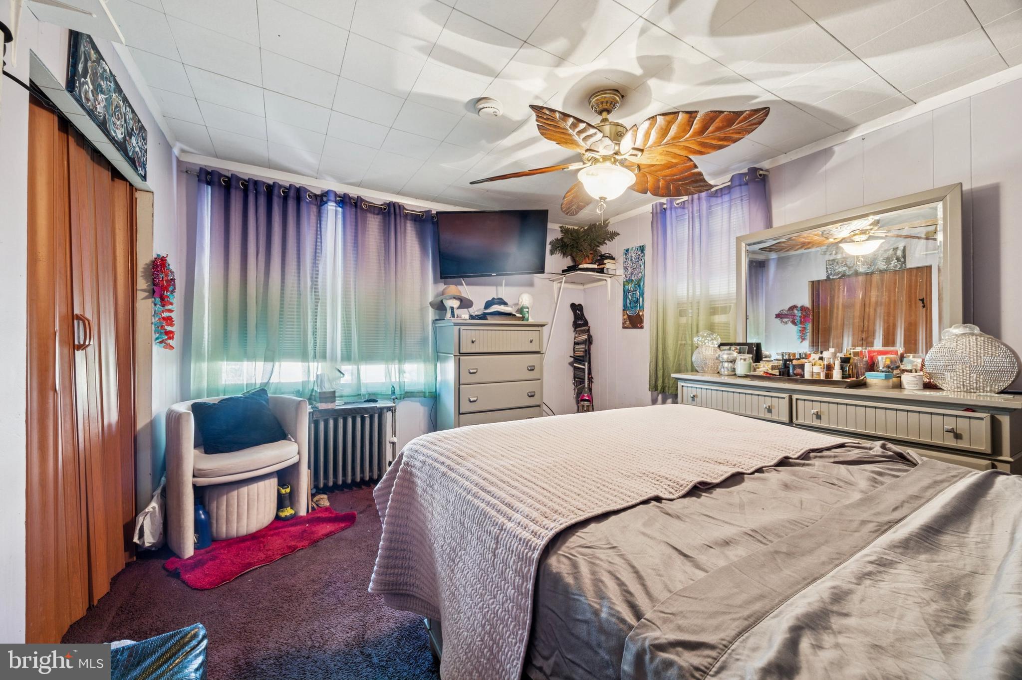 722 Yeadon Avenue Lansdowne, PA 19050 - Photo 15 of 23 a bedroom with furniture and a large window