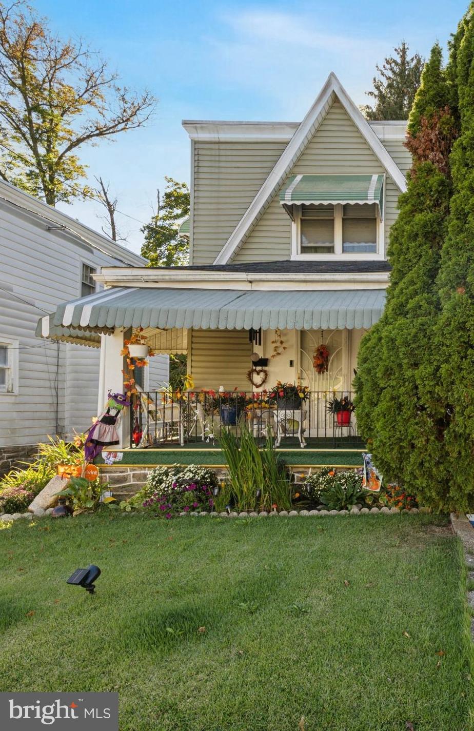 722 Yeadon Avenue Lansdowne, PA 19050 - Photo 2 of 23 a front view of a house with garden