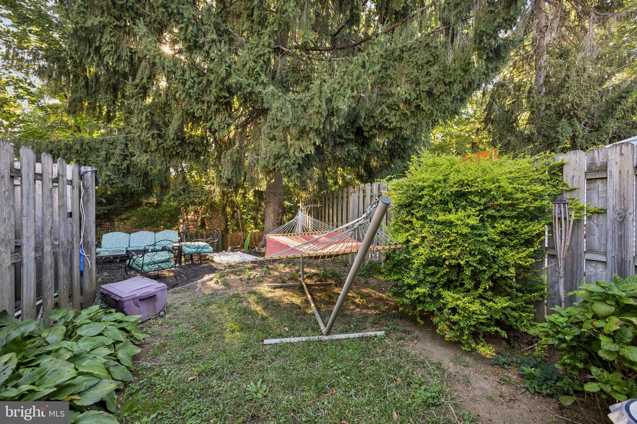 722 Yeadon Avenue Lansdowne, PA 19050 - Photo 22 of 23 a view of a chair and table in backyard
