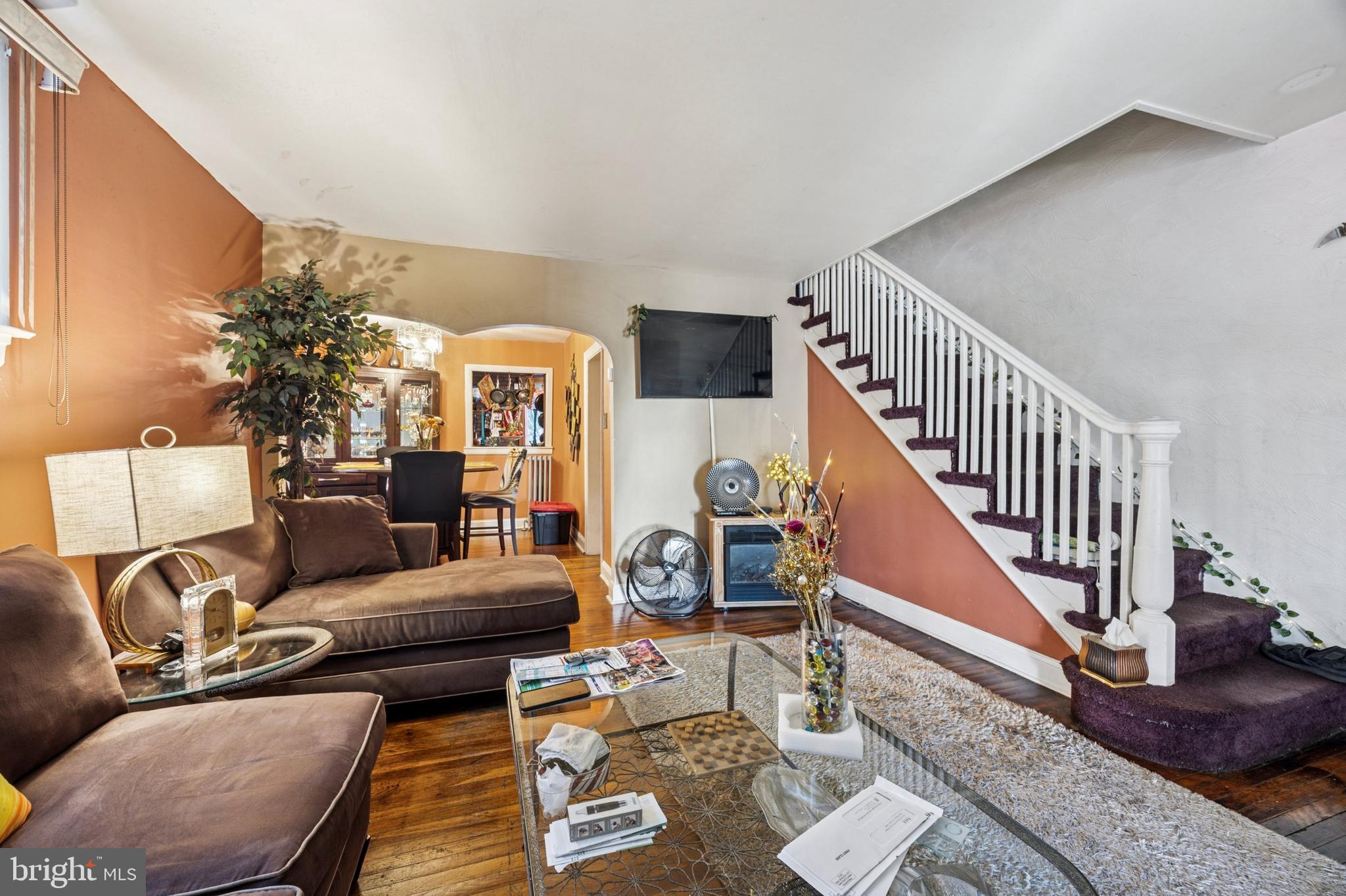 722 Yeadon Avenue Lansdowne, PA 19050 - Photo 5 of 23 a living room with furniture and a wooden floor