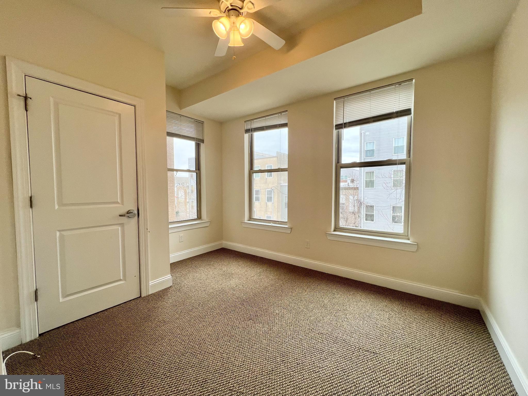 1806 North 16th Street, Unit A Philadelphia, PA 19121 - Photo 5 of 8 a view of an empty room with a window