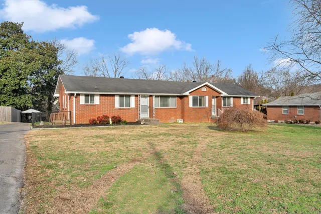 a house view with a garden space