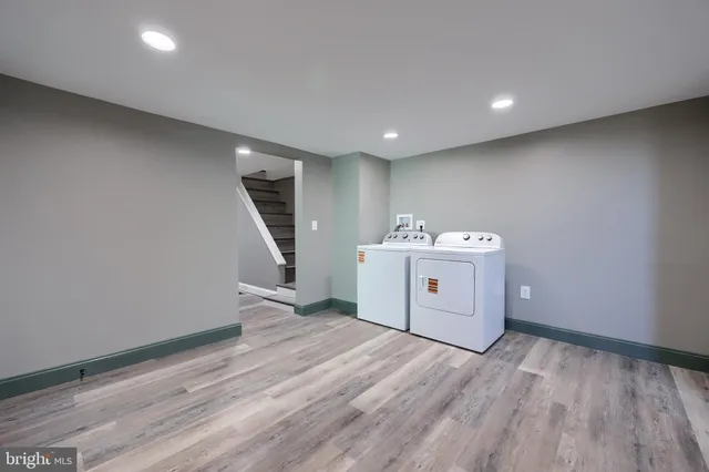 a utility room with washer and dryer