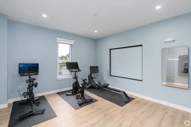 a view of a room with gym equipment