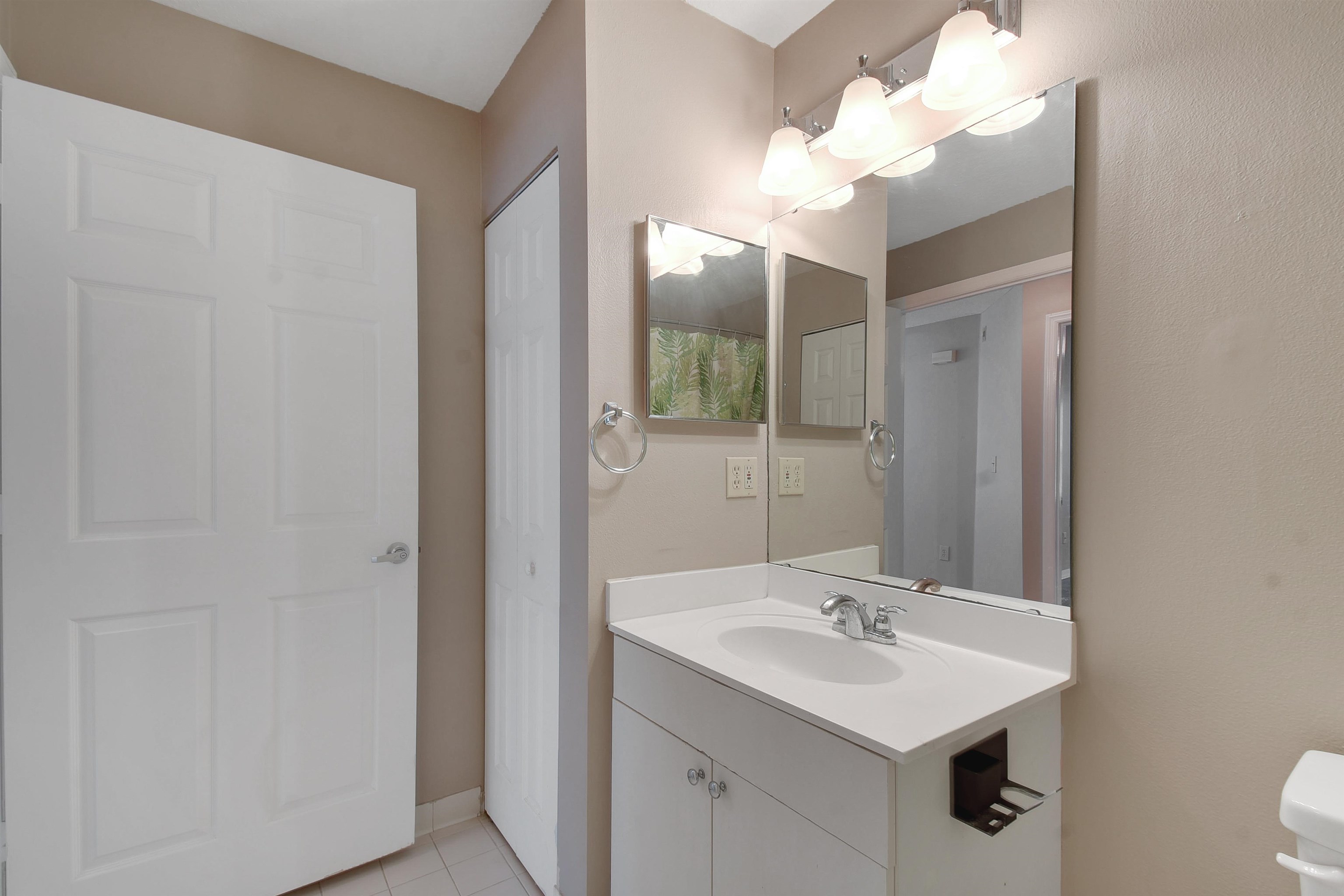 24200 Harbour Vista Circle St. Augustine, FL 32080 - Photo 20 of 30 a bathroom with a sink and a mirror
