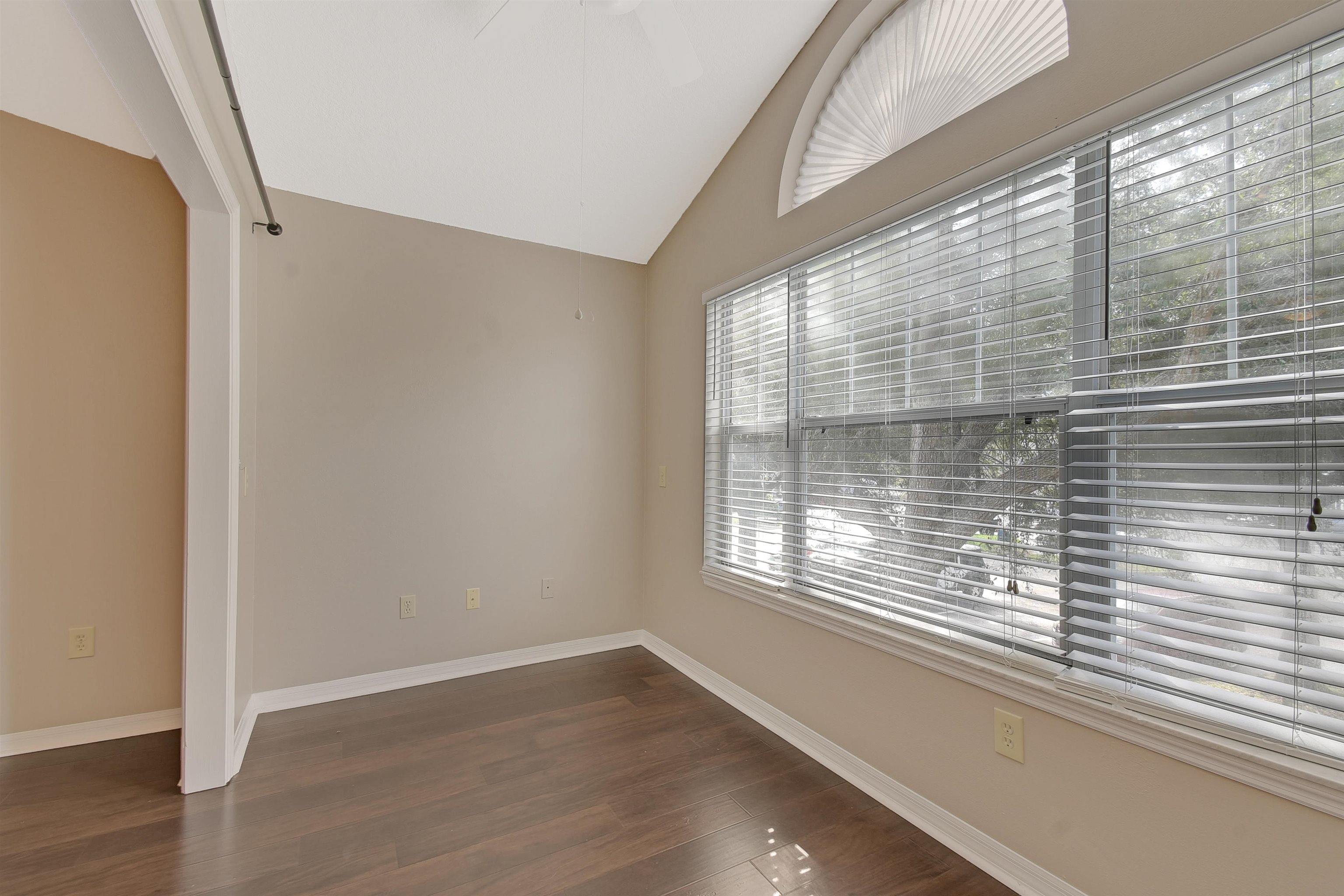 24200 Harbour Vista Circle St. Augustine, FL 32080 - Photo 25 of 30 a view of empty room with wooden floor and fan