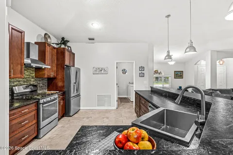 $400,000 | 676 Sheridan Woods Drive, Melbourne, FL 32904
