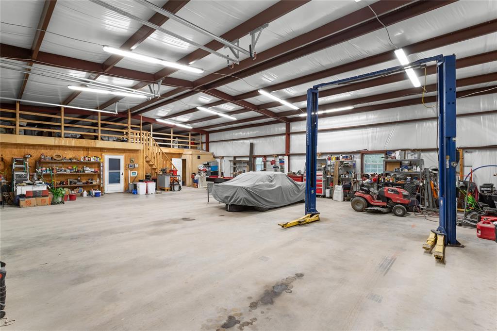 351 County Road 2601 Meridian, TX 76665 - Photo 22 of 40 a view of parking garage with cars