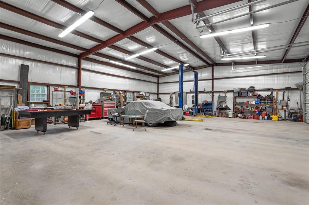 351 County Road 2601 Meridian, TX 76665 - Photo 24 of 40 a view of parking garage with cars