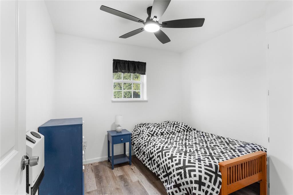 351 County Road 2601 Meridian, TX 76665 - Photo 29 of 40 a bedroom with bed and a window