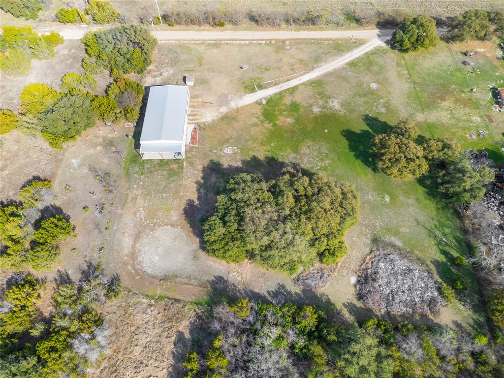 351 County Road 2601 Meridian, TX 76665 - Photo 3 of 40 a view of a garden with wooden floor