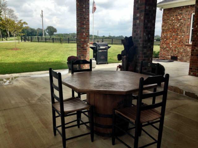 61 Myrick Road Flintville, TN 37335 - Photo 5 of 20 a view of a patio with a table chairs and a table