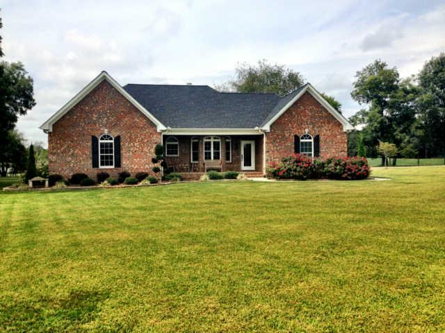 61 Myrick Road Flintville, TN 37335 - Photo 8 of 20 a front view of house with yard and green space