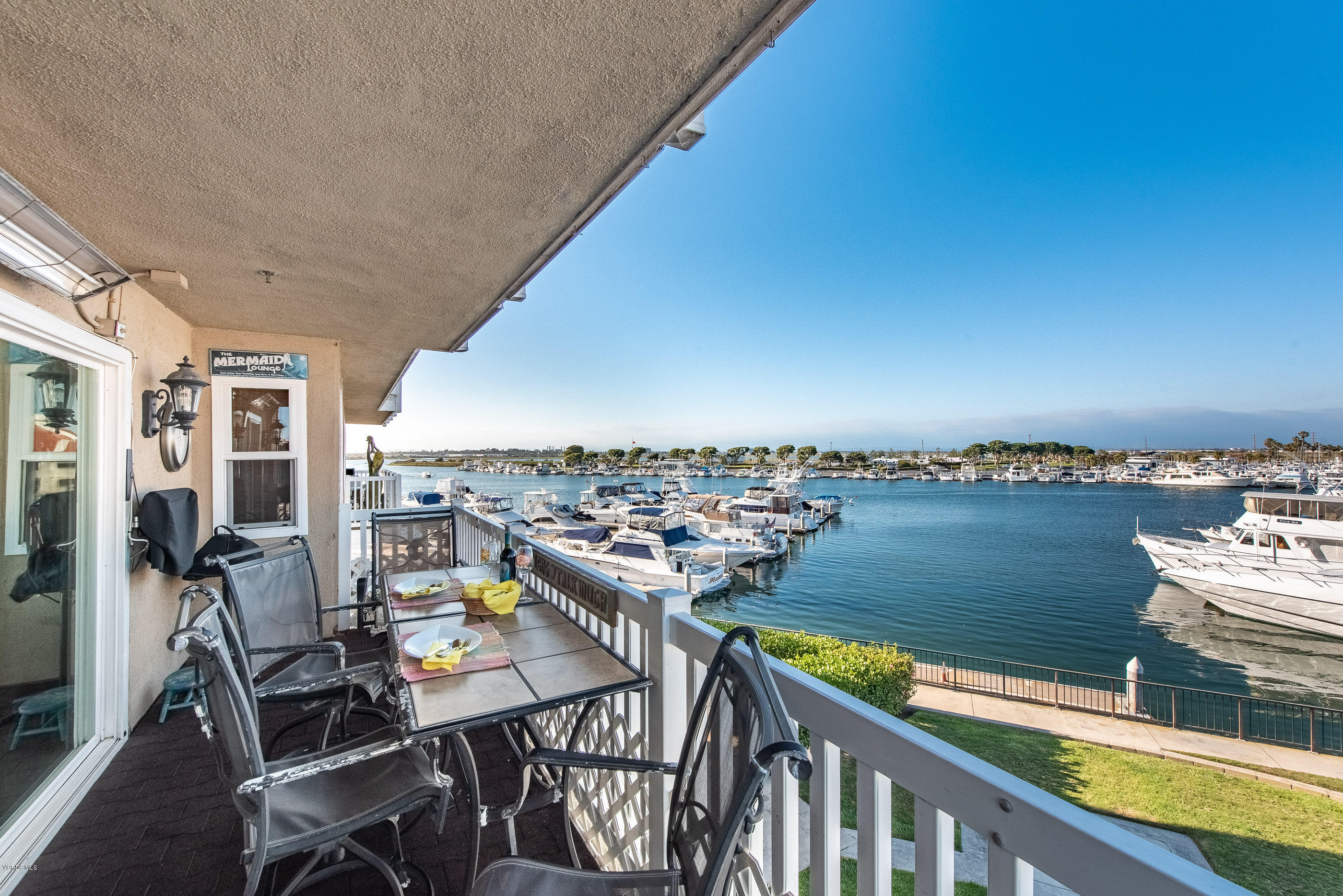 a view of a balcony with an ocean view