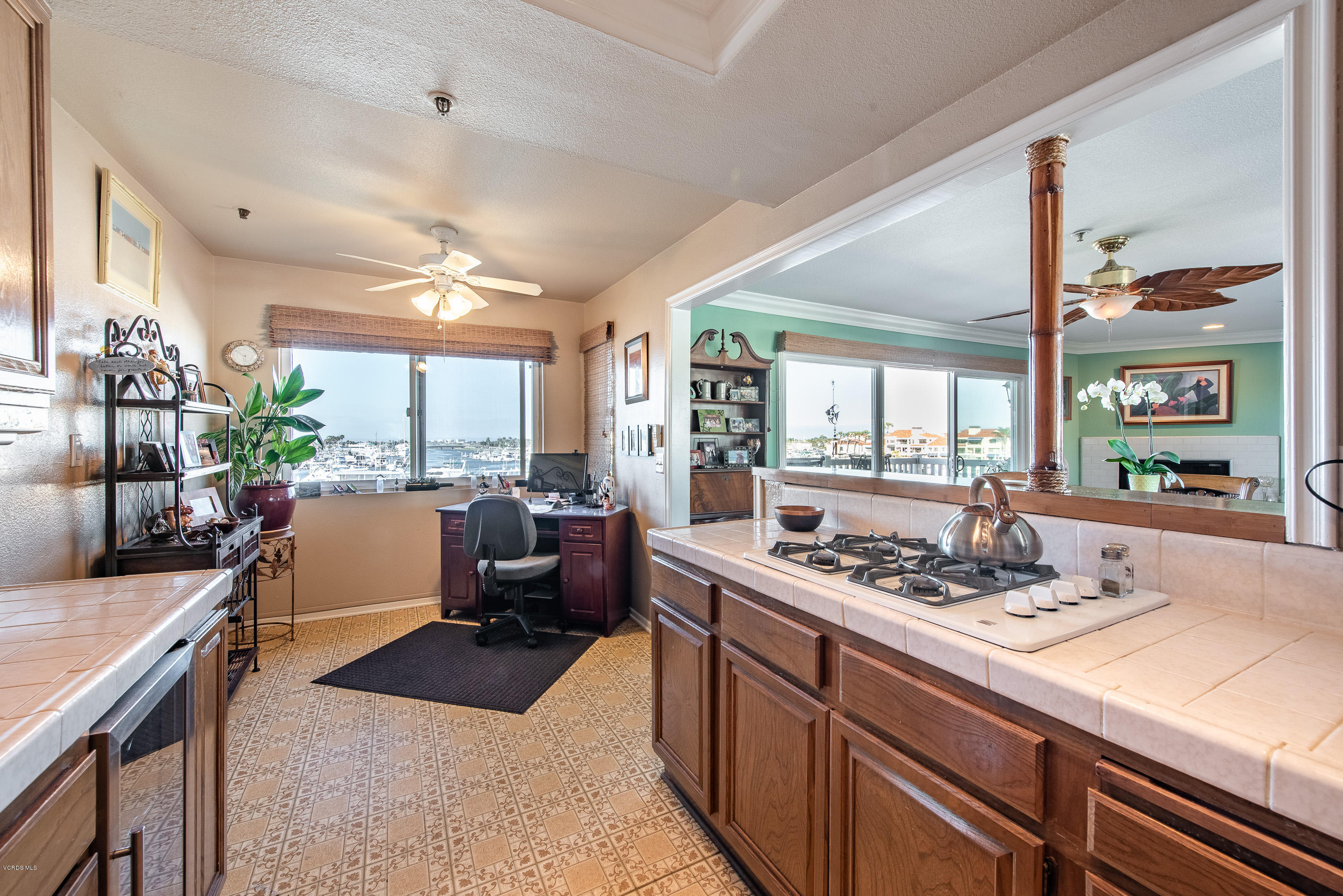 2872 Coast Circle, Unit 203 Huntington Beach, CA 92649 - Photo 18 of 42 a kitchen with a counter space a sink and appliances