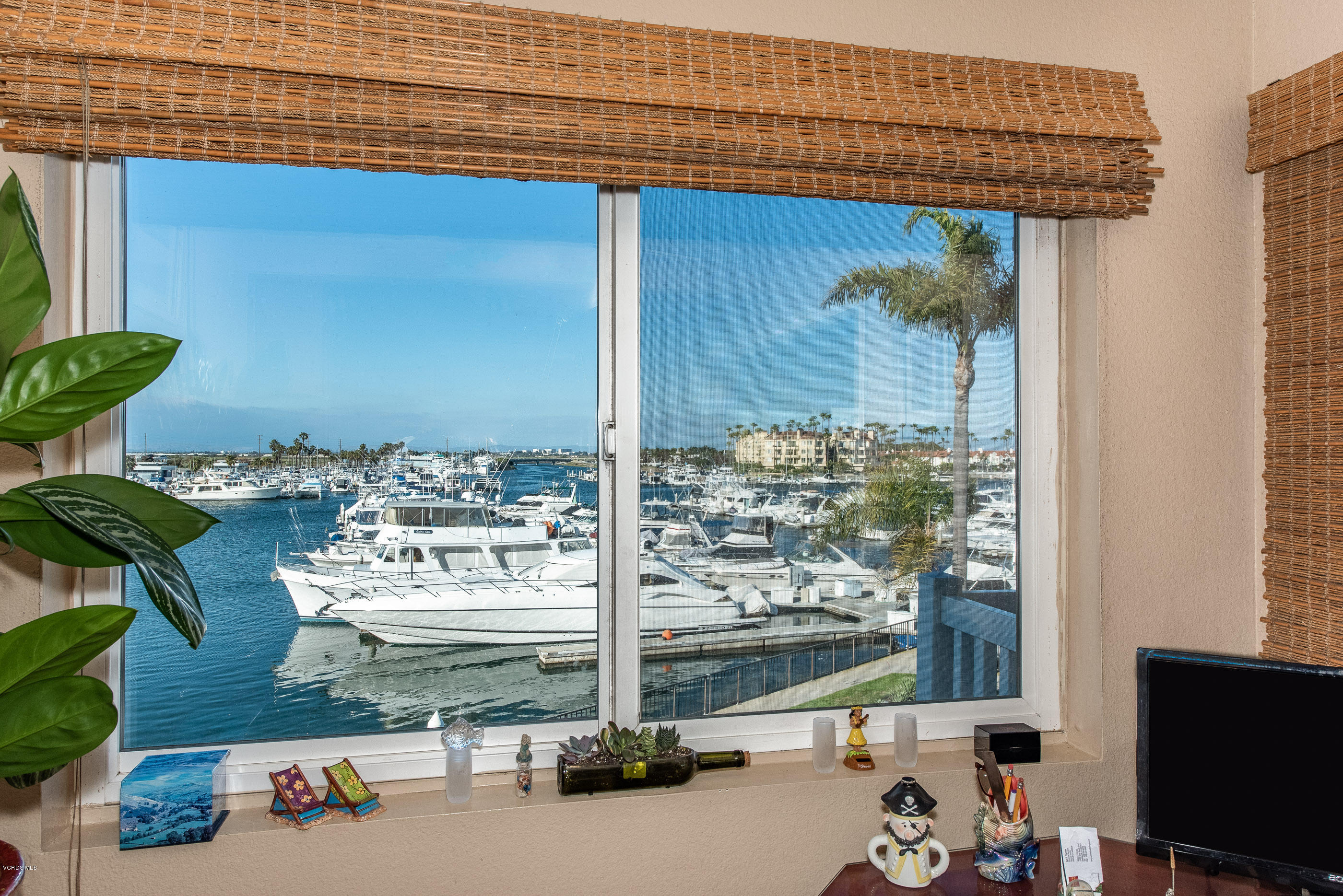 2872 Coast Circle, Unit 203 Huntington Beach, CA 92649 - Photo 3 of 42 a room with water heater and a potted plant