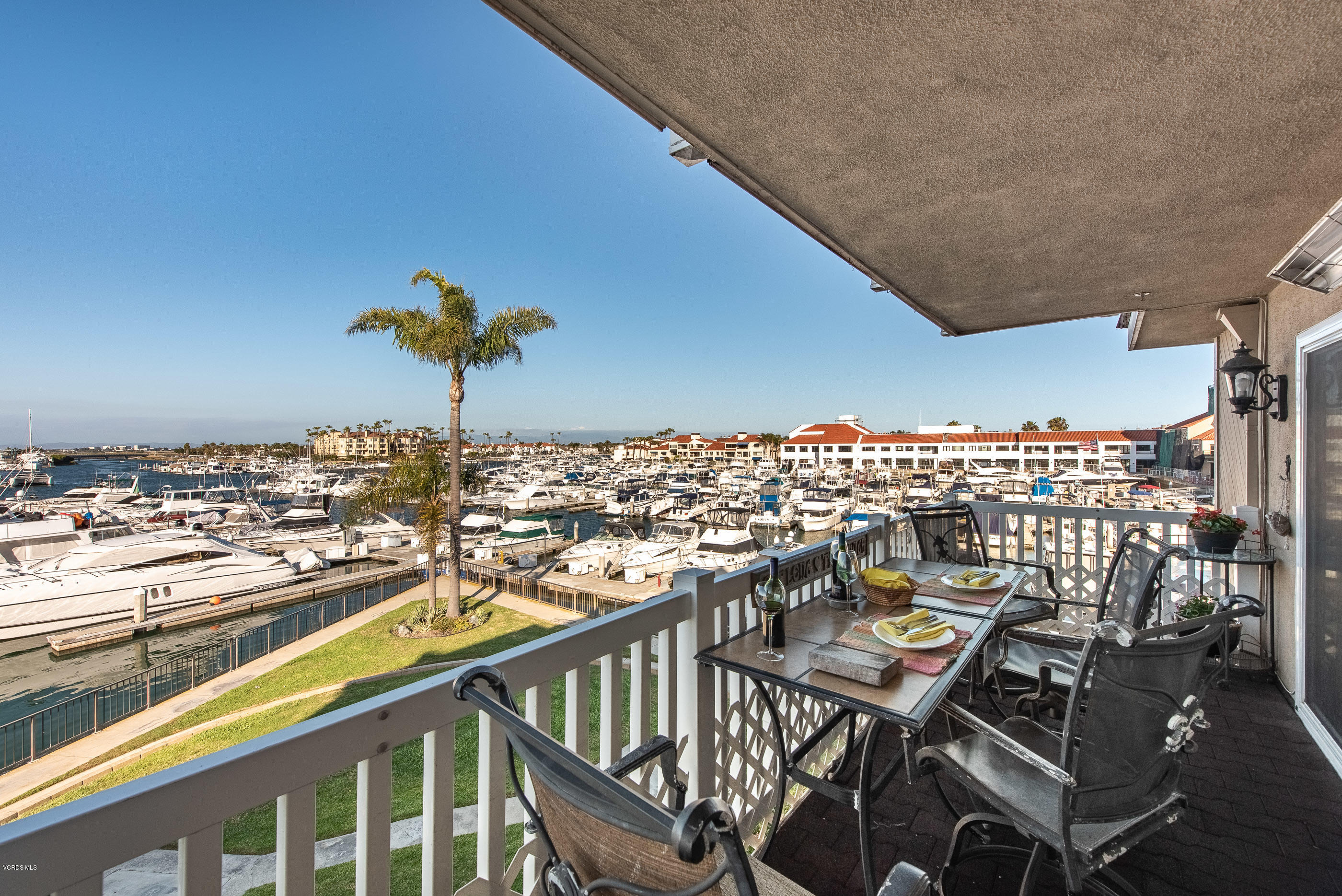 2872 Coast Circle, Unit 203 Huntington Beach, CA 92649 - Photo 21 of 42 a view of a balcony with an ocean view