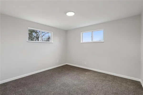 an empty room with a workbench